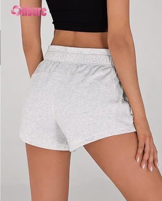 Shorts de sport décontractés et respirants pour femmes, coupe ample, taille élastique pour le plein air, le yoga, la course, et le bien-être.