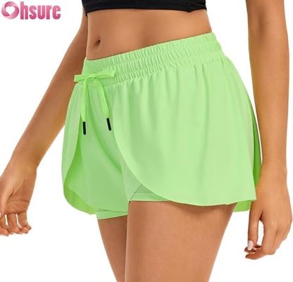 Shorts de gymnastique pour femmes à jupe flottante en 2 en 1 Shorts de course enveloppés avec poche taille haute Vêtements de sport pour l'entraînement de yoga