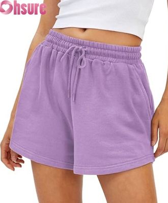 Shorts de sport taille haute pour femmes à séchage rapide, jupes-shorts respirantes avec poches pour la course et l'exercice, décoration à motifs à la mode