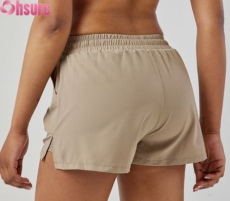 Shorts de sport haute taille pour femmes à séchage rapide respirant Shorts de course et d'exercice à la mode avec poches