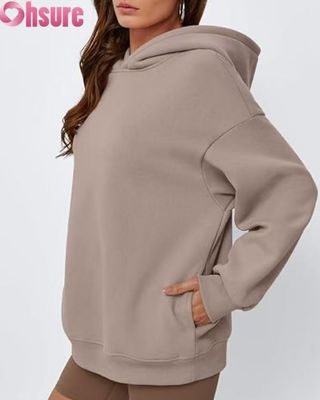 Hoodie en laine surdimensionnée pour femmes pull-over en couleur solide pull-over avec poche.