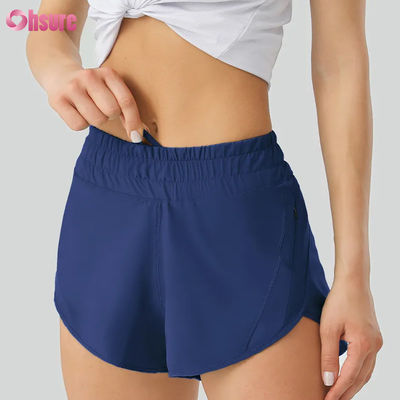 Shorts de yoga décontractés pour femmes hautement respirants Pantalon d'entraînement en polyester sec rapide avec poches de taille élastiques pour le sport et la course