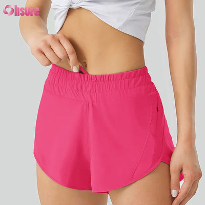 Shorts de yoga décontractés pour femmes hautement respirants Pantalon d'entraînement en polyester sec rapide avec poches de taille élastiques pour le sport et la course