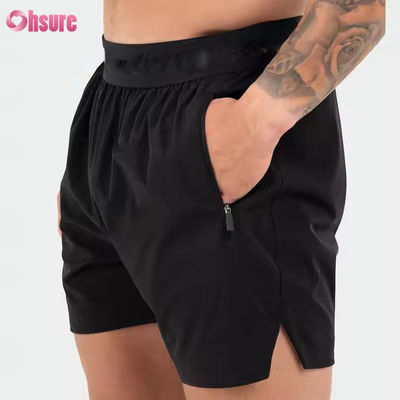 Logo personnalisé sur la ceinture Polyester Poches Split Hem Pour Hommes Sports Active Hommes Gymnastic Gymnastic Shorts pour hommes