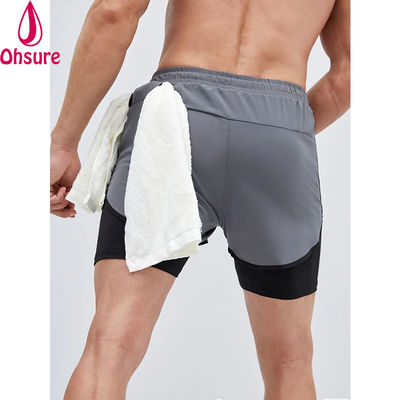 Shorts de sport 2 en 1 pour hommes avec taille élastique et cordon de serrage, bande réfléchissante, entraînement en salle de sport pour hommes