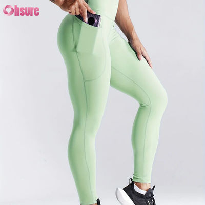 Leggings de yoga taille haute à séchage rapide pour le fitness sportif, avec effet push-up et poches latérales pour femmes