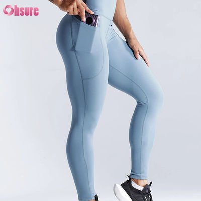 Leggings de yoga taille haute à séchage rapide pour le fitness sportif, avec effet push-up et poches latérales pour femmes