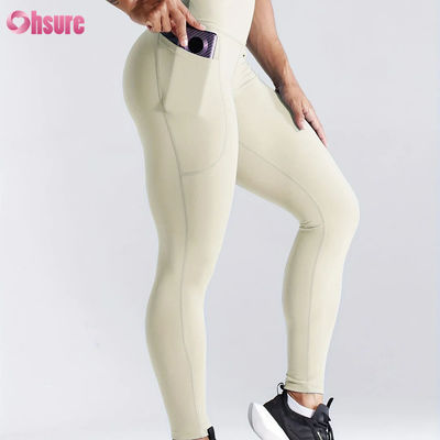 Leggings de yoga taille haute à séchage rapide pour le fitness sportif, avec effet push-up et poches latérales pour femmes