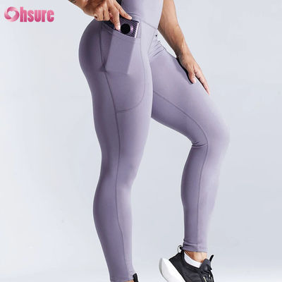 Leggings de yoga taille haute à séchage rapide pour le fitness sportif, avec effet push-up et poches latérales pour femmes