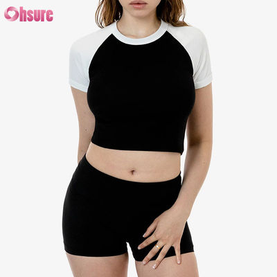 T-shirt de sport 100% coton pour femmes, manches tricotées et étirées, haut décontracté respirant avec option de logo personnalisé.