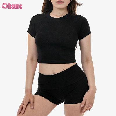 T-shirt de sport 100% coton pour femmes, manches tricotées et étirées, haut décontracté respirant avec option de logo personnalisé.