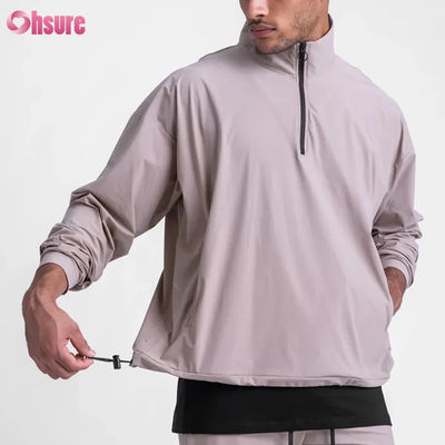 Vêtement en tissu résistant à l'eau et respirant pour hommes à haute qualité, à demi fermeture à glissière, à fond réglable, design mock col pour l'hiver