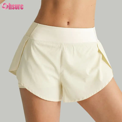 Vente à chaud Shorts de course de taille haute pour femmes Rapide sec Double couche Pantalon d'entraînement athlétique Poches respirantes Fitness Yoga porter