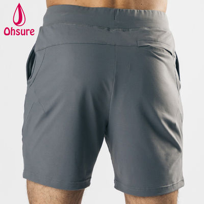 Shorts de sport pour hommes, entraînement en salle de sport, poches avant profondes, extensible dans les quatre sens, matériau léger, design de logo personnalisé par le fabricant d'équipement d'origine