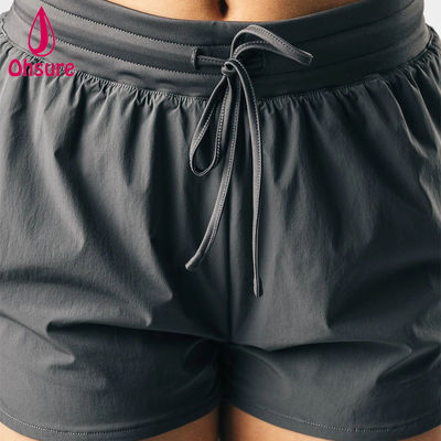 Des vêtements de haute qualité OEM design de haute coupe courts de sport à haute taille femmes gymnastique gymnastique course yoga bottoms courts tissés occasionnels