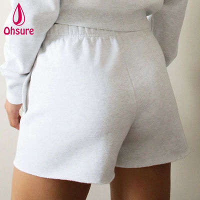 Shorts de survêtement taille haute avec logo personnalisé en gros pour femmes, shorts d'entraînement de fitness pour la salle de sport, taille haute, coupe ample, poches à l'entrejambe, ourlet brut, décontracté