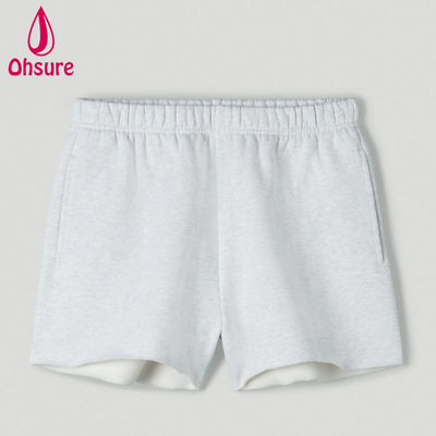 Shorts de survêtement taille haute avec logo personnalisé en gros pour femmes, shorts d'entraînement de fitness pour la salle de sport, taille haute, coupe ample, poches à l'entrejambe, ourlet brut, décontracté