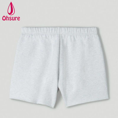 Shorts de survêtement taille haute avec logo personnalisé en gros pour femmes, shorts d'entraînement de fitness pour la salle de sport, taille haute, coupe ample, poches à l'entrejambe, ourlet brut, décontracté