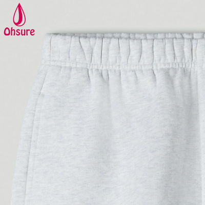 Shorts de survêtement taille haute avec logo personnalisé en gros pour femmes, shorts d'entraînement de fitness pour la salle de sport, taille haute, coupe ample, poches à l'entrejambe, ourlet brut, décontracté