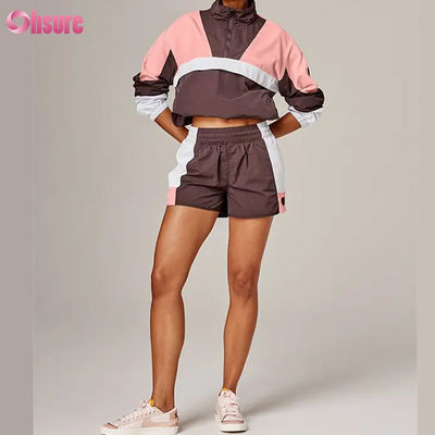 Vêtements de sport multicolores de haute qualité pour femmes Vêtements de pluie de style vintage Vêtements en tissu tricoté à l'épreuve du vent à capuche pour le cyclisme Courir en plein air