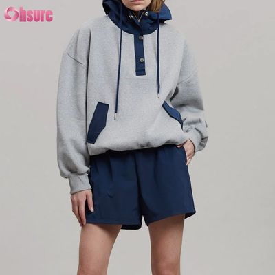 Design de mode Confortable Coton Style surdimensionné Bouton Contraste Couleur Poche Sweat à capuche pour femmes