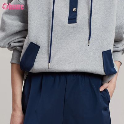Design de mode Confortable Coton Style surdimensionné Bouton Contraste Couleur Poche Sweat à capuche pour femmes
